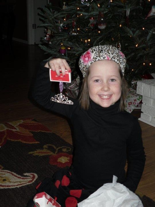 Girl showing her gift